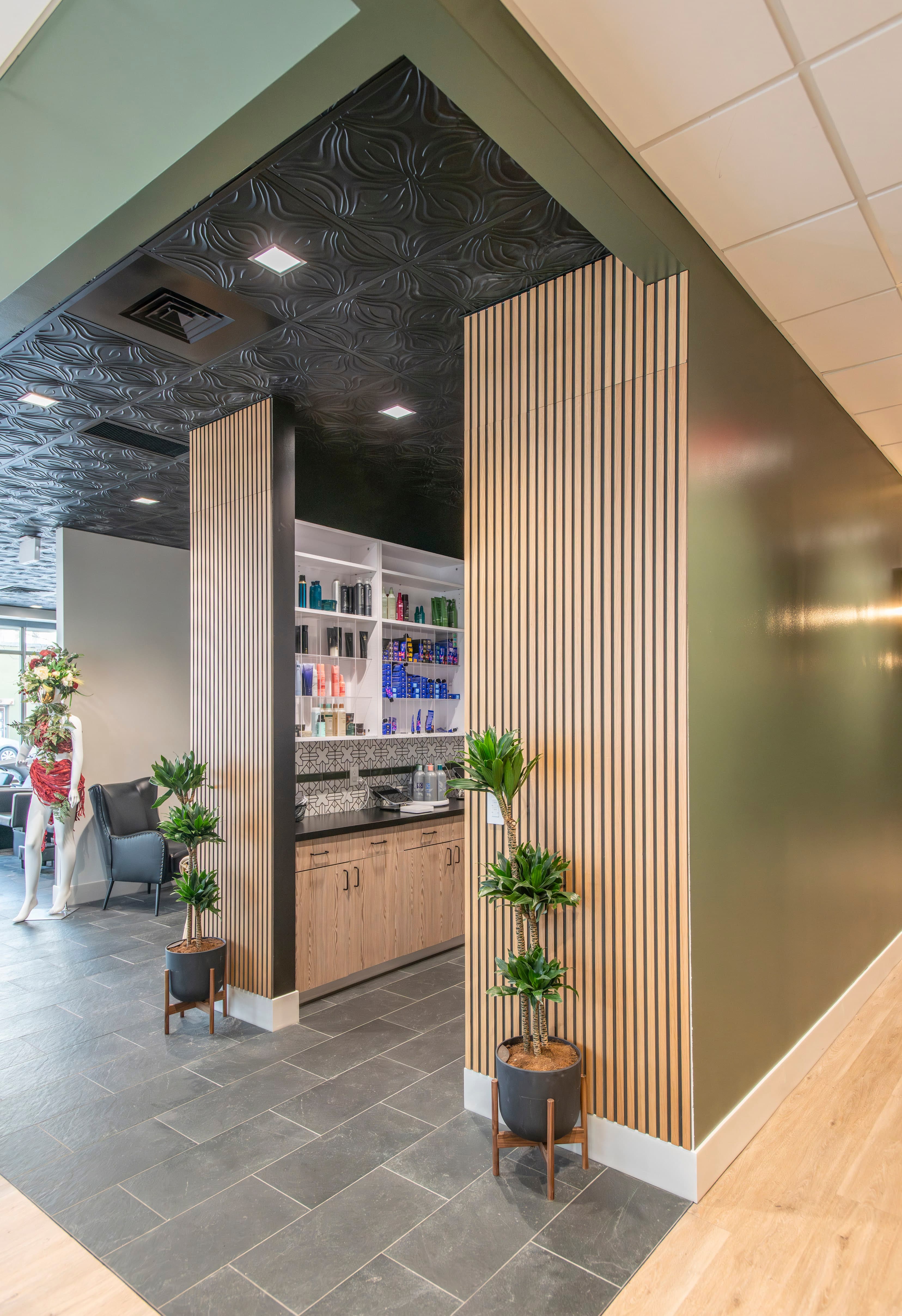 Graeber & Company Salon reception area with custom curved wall features in downtown Boise Idaho