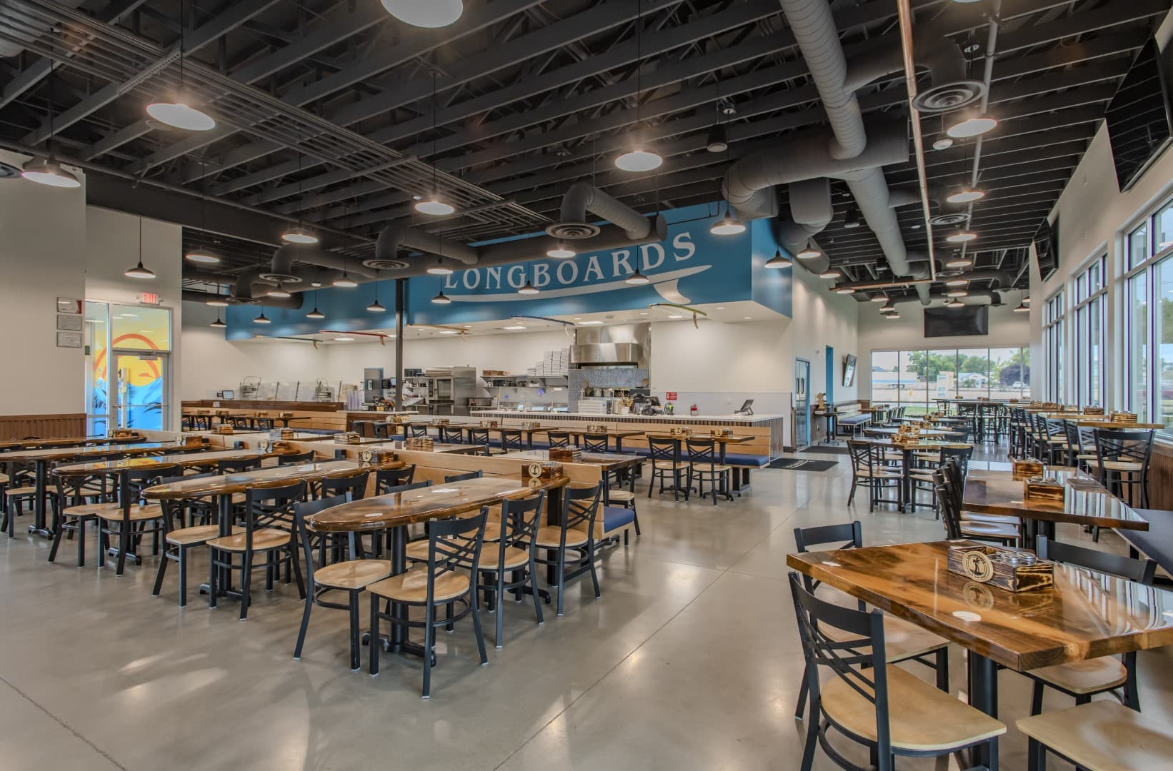 Longboards Beach Fired Pizza restaurant entrance by OVI contractor in Nampa Idaho